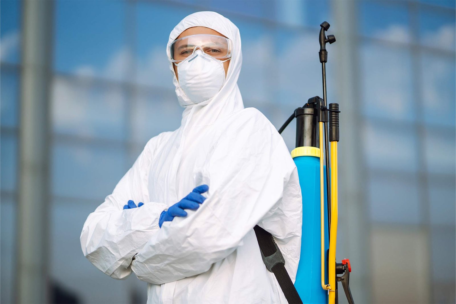 disinfecting-to-prevent-covid-19-man-in-protectiv-2025-03-05-05-32-49-AYUVLQG.jpg